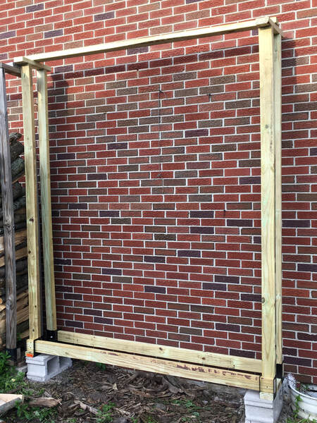 Easy DIY log rack anyone can build to season & store firewood year-round